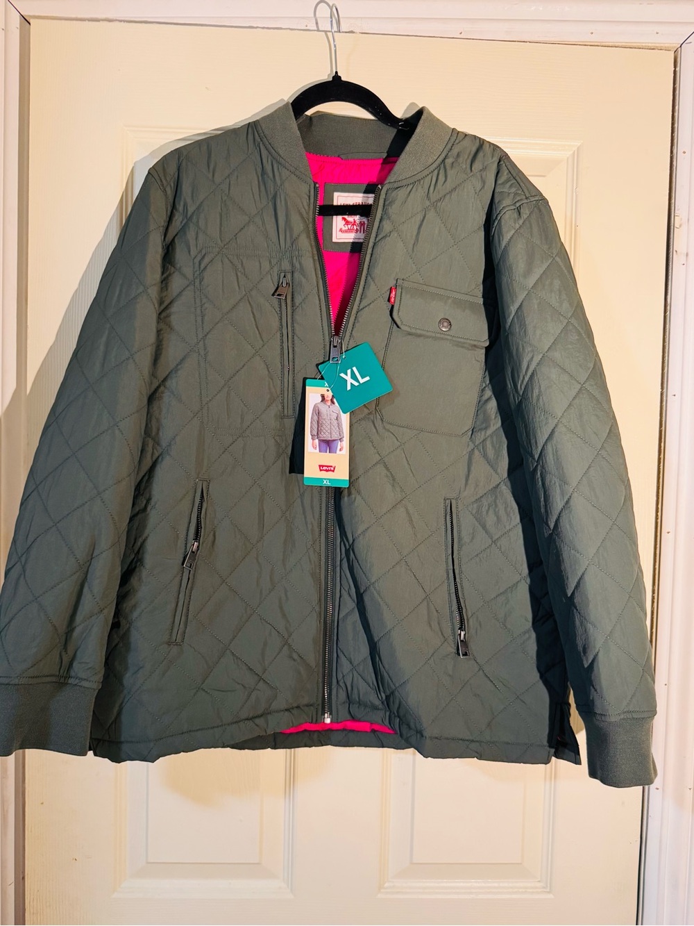 Levi's Quilted Puffer Jacket in Olive Green with Pink Lining
